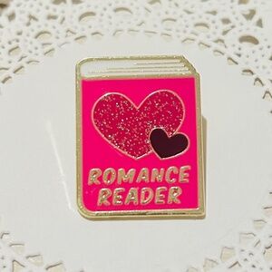 Romance Reader Pink Enamel Pin with Sparkling Hearts.